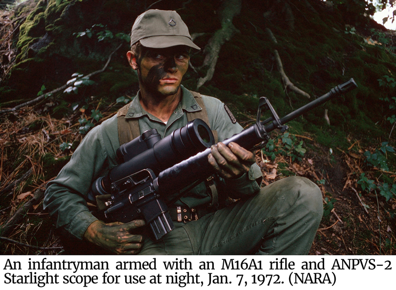 Photo of an infantryman armed with an M16A1 rifle and ANPVS-2 Starlight scope for use at night, Jan. 7, 1972. (NARA)